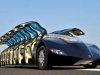 A Dutch astronaut has unveiled a new multi-million pound 'uber bus' which could revolutionise the way commuters use public transport. See SWNS story SWBUS: The 'Superbus' is an electric vehicle which boasts six wheels, 16 gullwing doors and transport for 23 passengers. Its electric motor makes it eco-friendly but thanks to some clever engineering it's also 'sports car' quick and should have a top speed of 155mph. The futuristic vehicle is the brainchild of Holland's first ever astronaut, Wubbo Ockels, (both corr) who has been working alongside boffins from Delft University of Technology in Holland.
